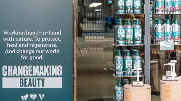 The Body Shop store with sustainable posters