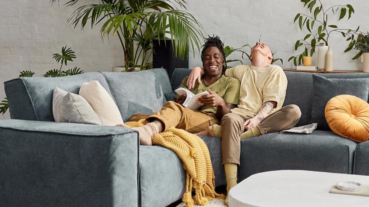 Two people on the couch with Kaola rests products