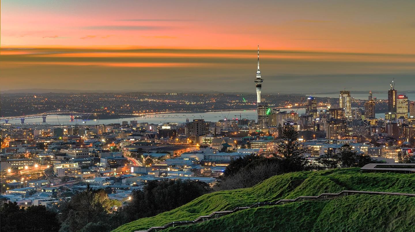 An image of the Auckland skyline during sunset