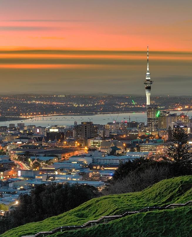 An image of the Auckland skyline during sunset